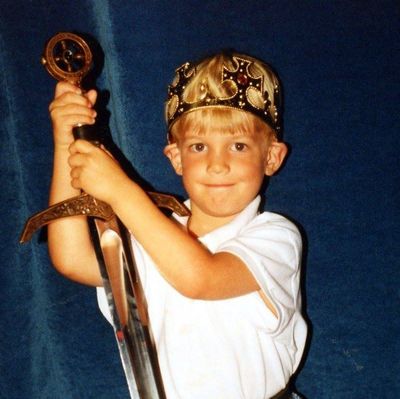 Young Ben holding a real sword